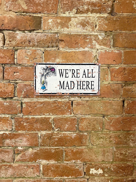 Vintage Metal Sign - Alice In Wonderland - We're All Mad Here